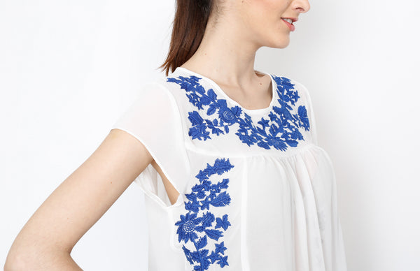 White Woven Top with Blue Floral Detail