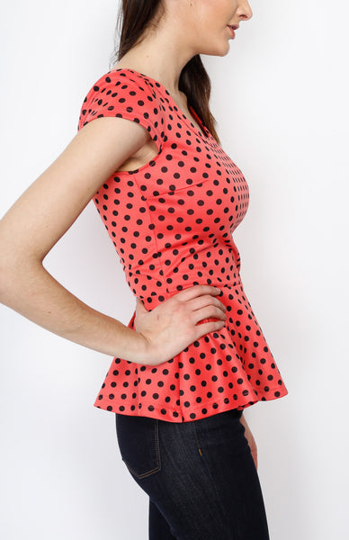 Coral Polka Dot Peplum Top